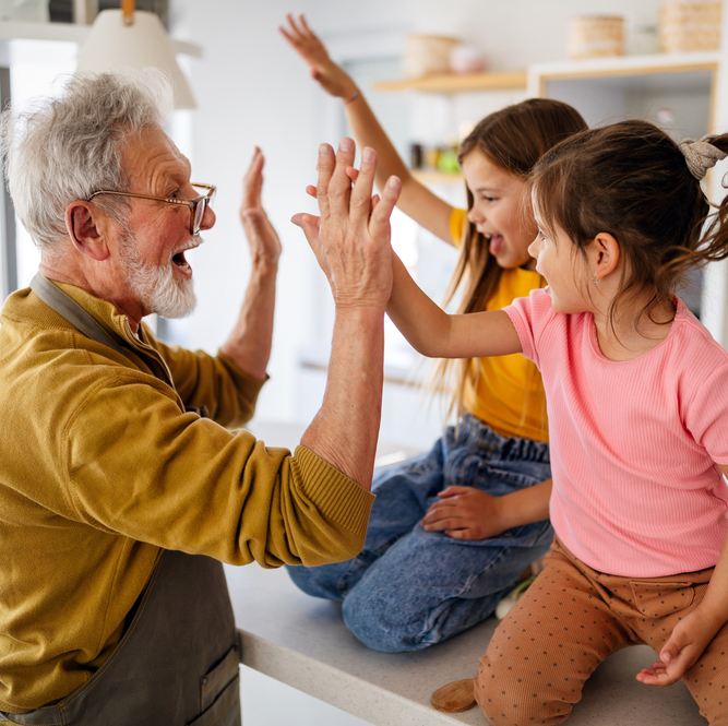 Grandpa in his workshop entertaining grandkids