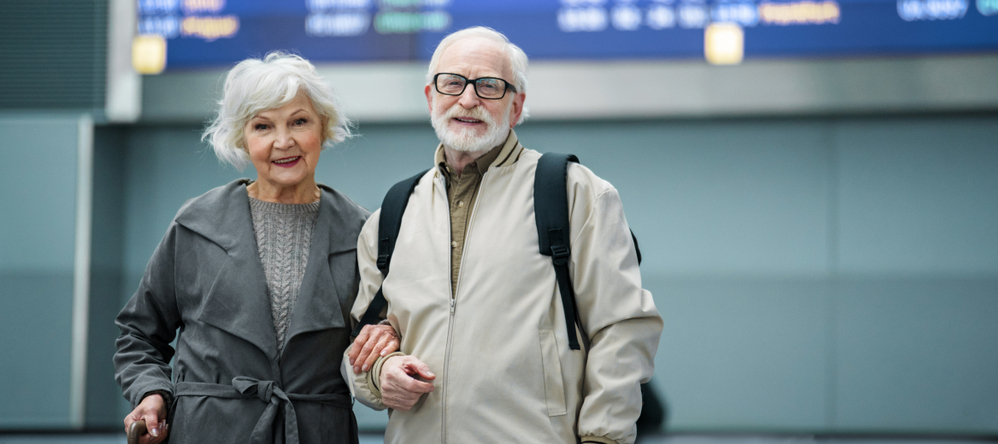 Retired couple at airport
