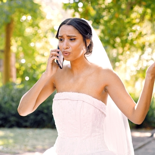 Bride in a heated, stressful phone conversation