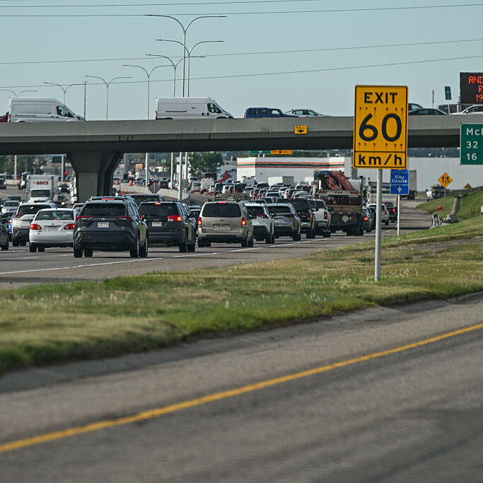 Traffic flows at the entrance to Calgary along Highway 2 (Queen Elizabeth II Highway), in Calgary, Alberta, Canada