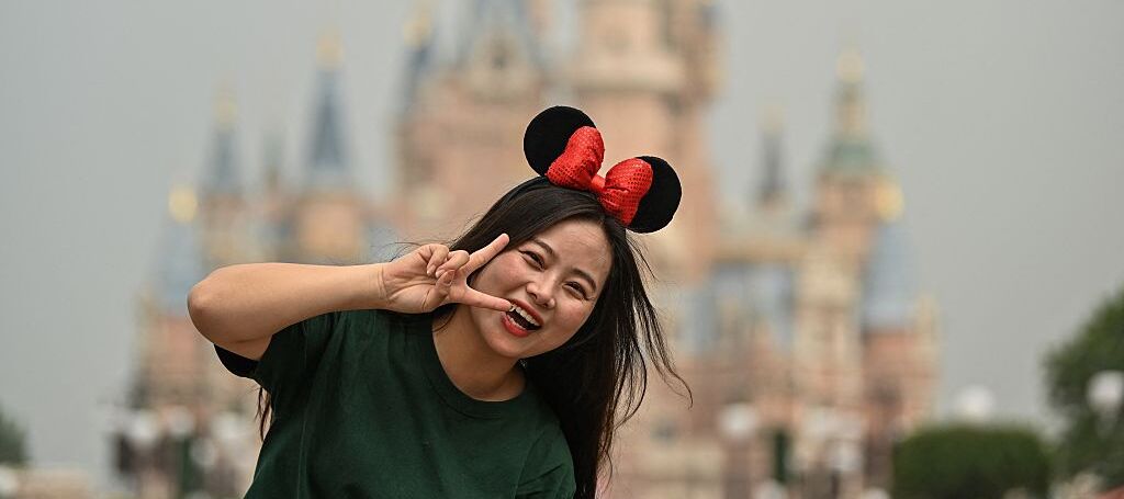 Woman at Disneyland smiling