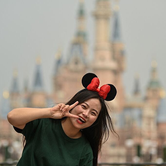 Woman at Disneyland smiling
