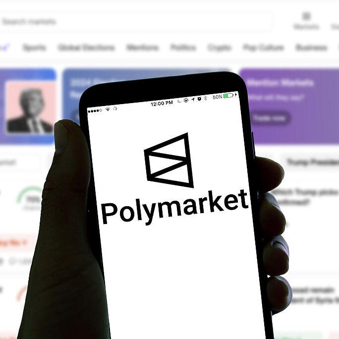 Polymarket logo on phone