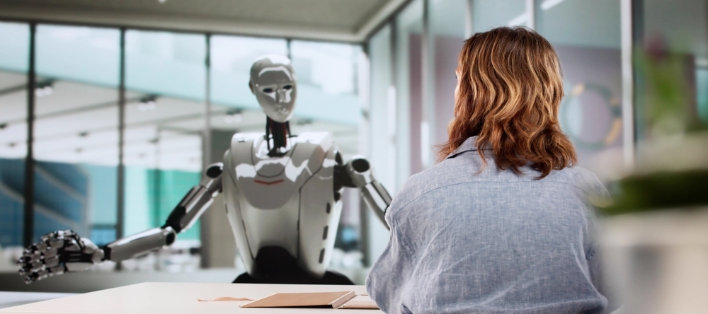 Woman speaking to robot for financial advice