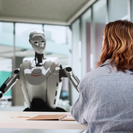 Woman speaking to robot for financial advice