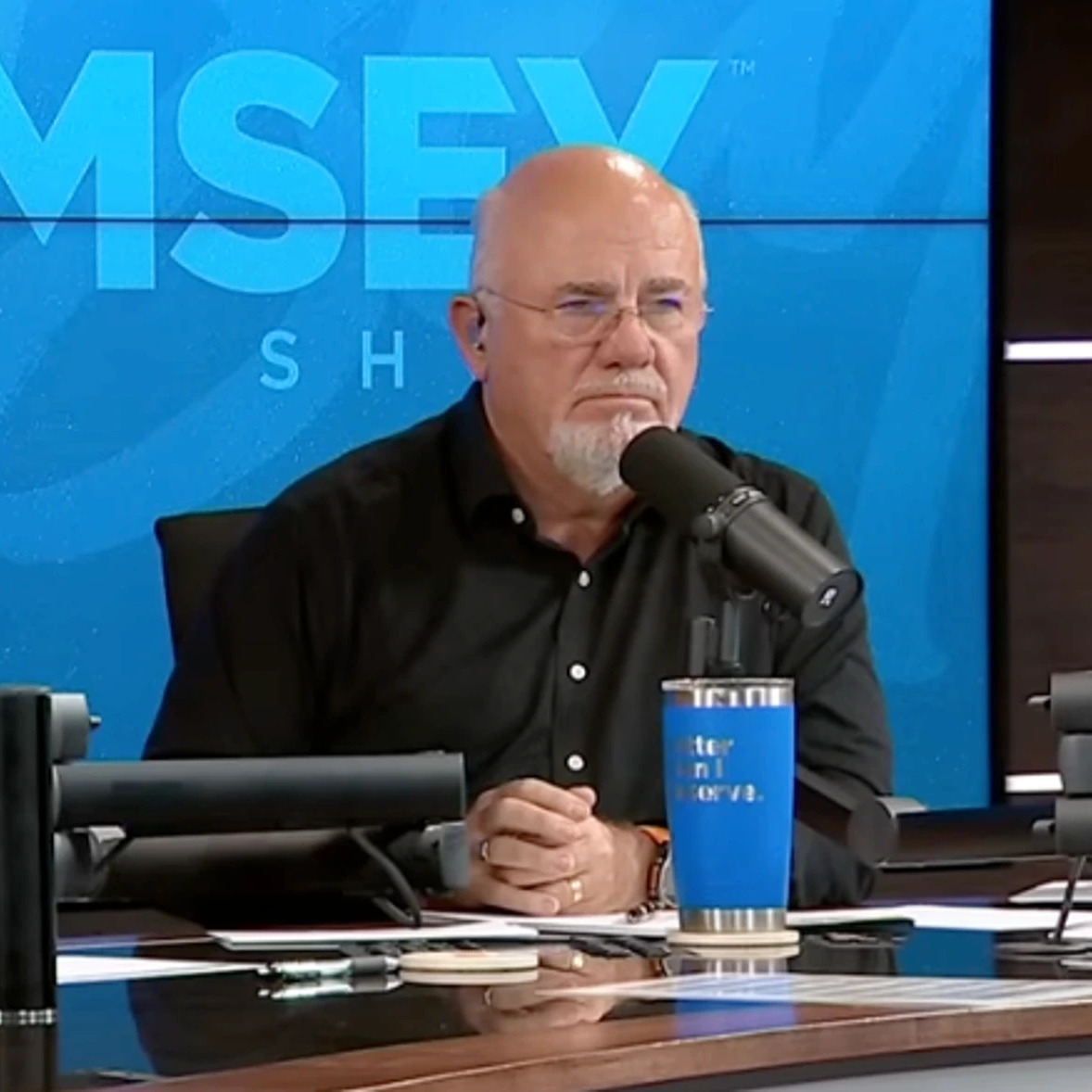 Dave Ramsey and Jade Warshaw on the set of his show