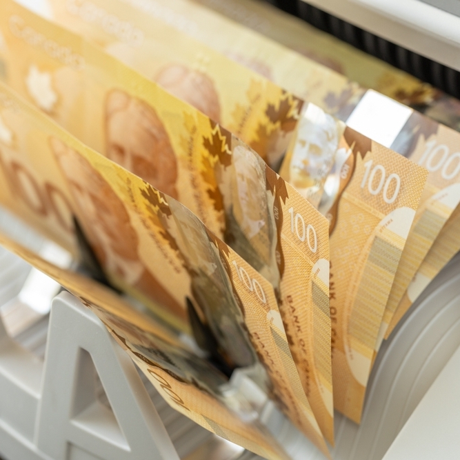Canadian $100 bills in counting machine