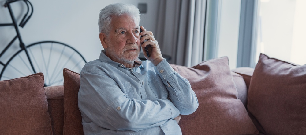 Older man on phone