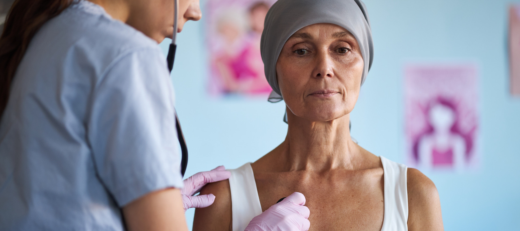 Image of a woman with cancer getting a check up