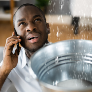 Emergency plumber call. Water leak from ceiling