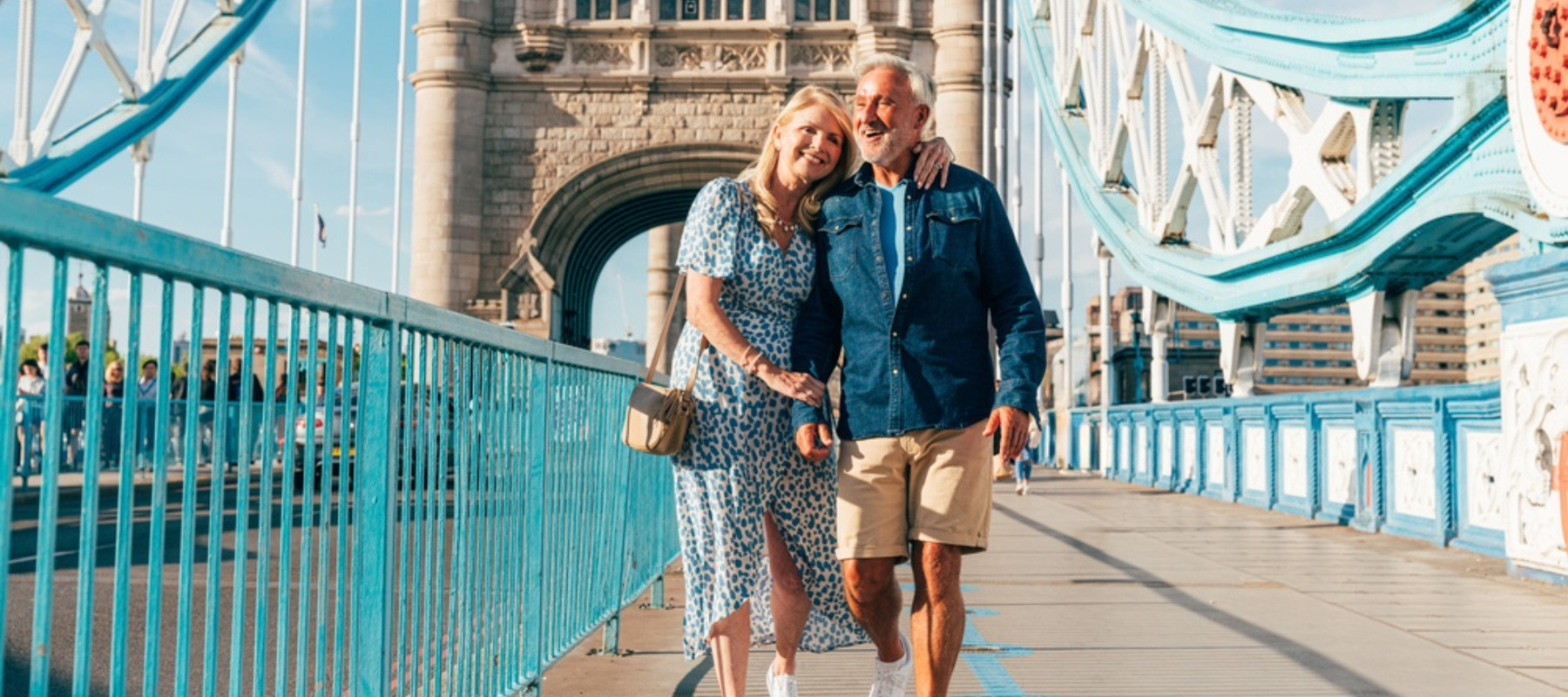 Man and woman on vacation walking together looking in love