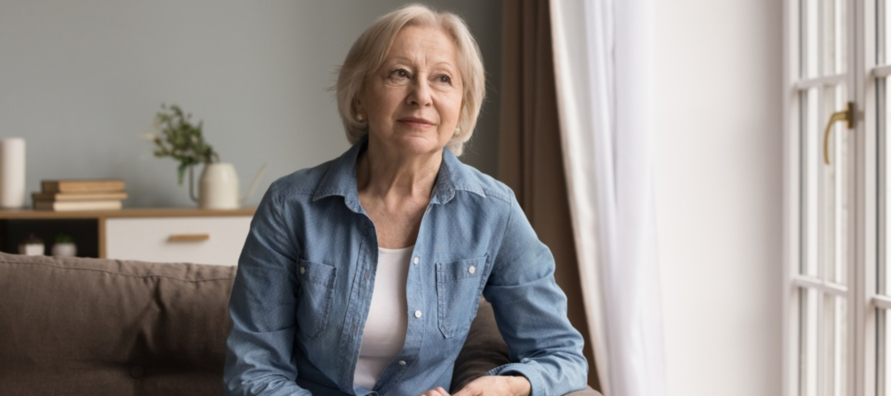 Woman sitting on couch