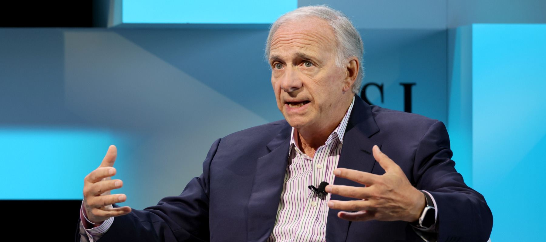 Ray Dalio speaking at an event