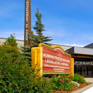 Legislative Assembly Whitehorse Yukon Territory + A Yukon Air Northern passenger jet approaches YVR airport