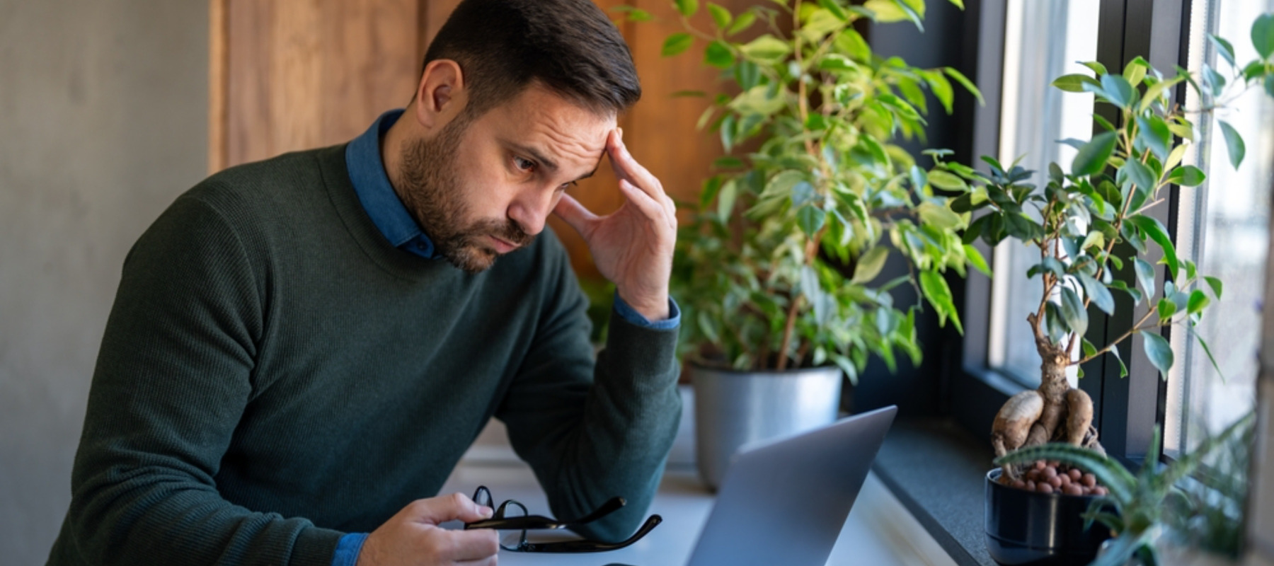 Stressed investor analyzing stock exchange market