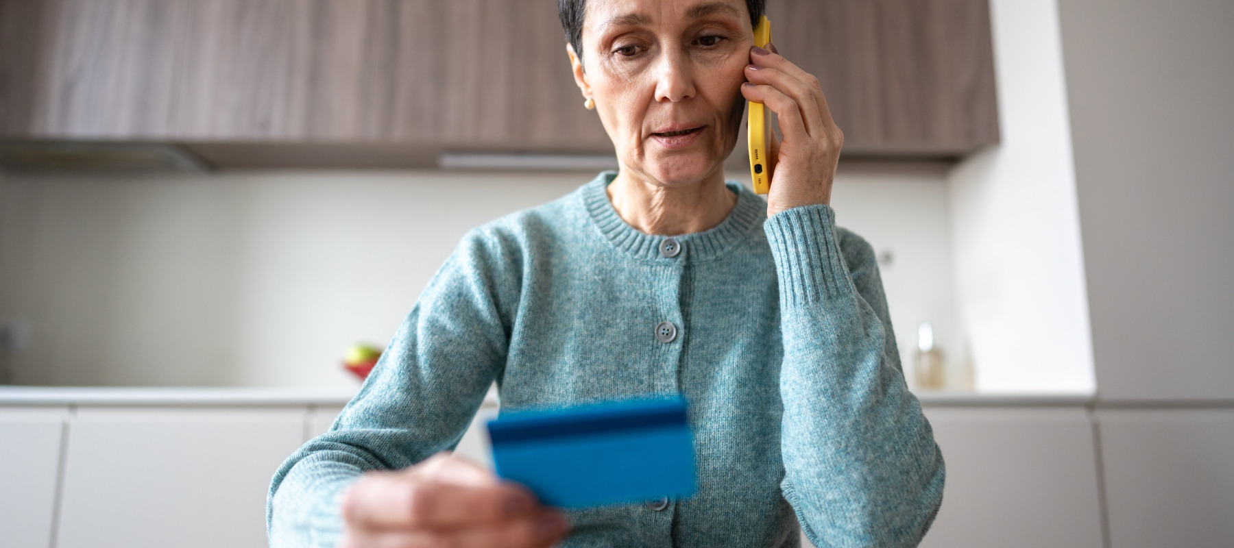 Woman dealing with phone scam