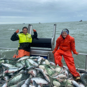 Two people fish in the morning fog + Female commercial fishermen in Bristol Bay, Alaska