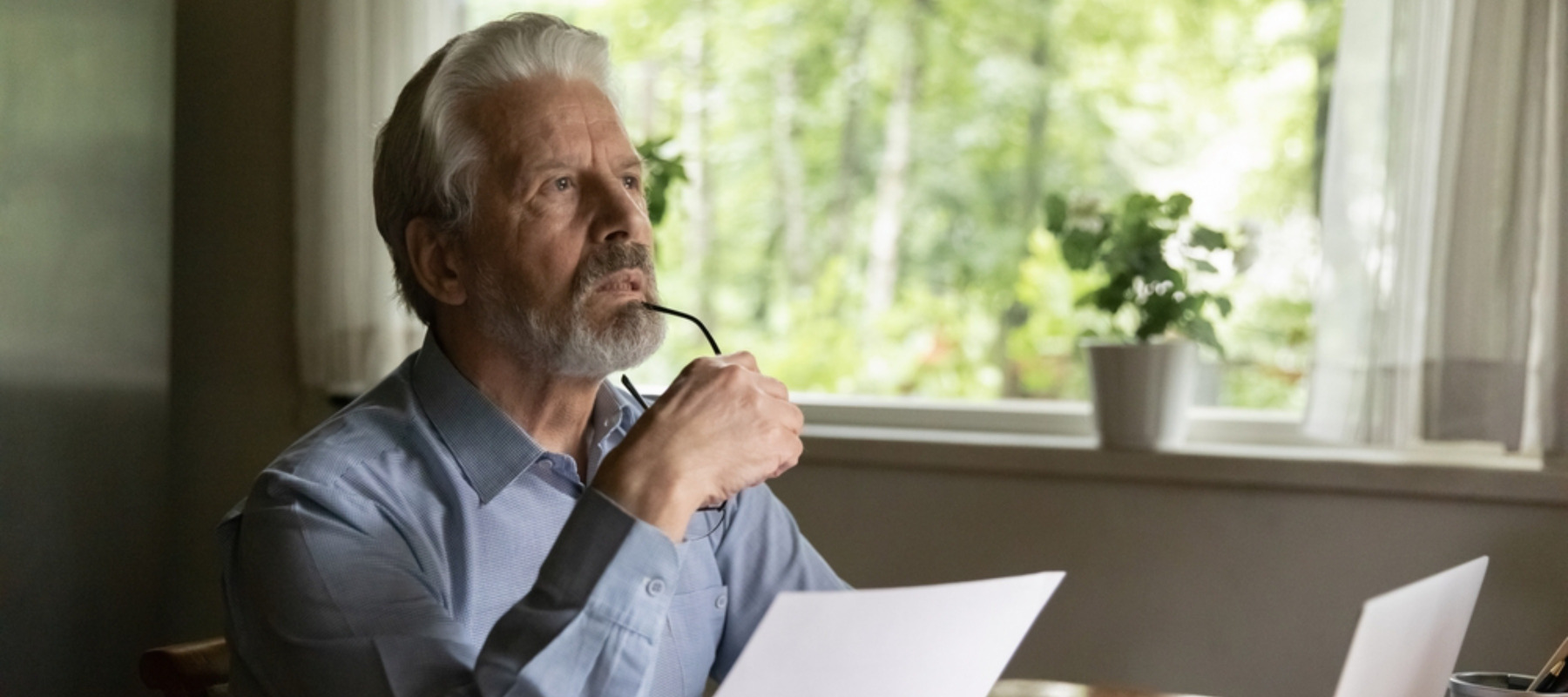 Pensive elderly male