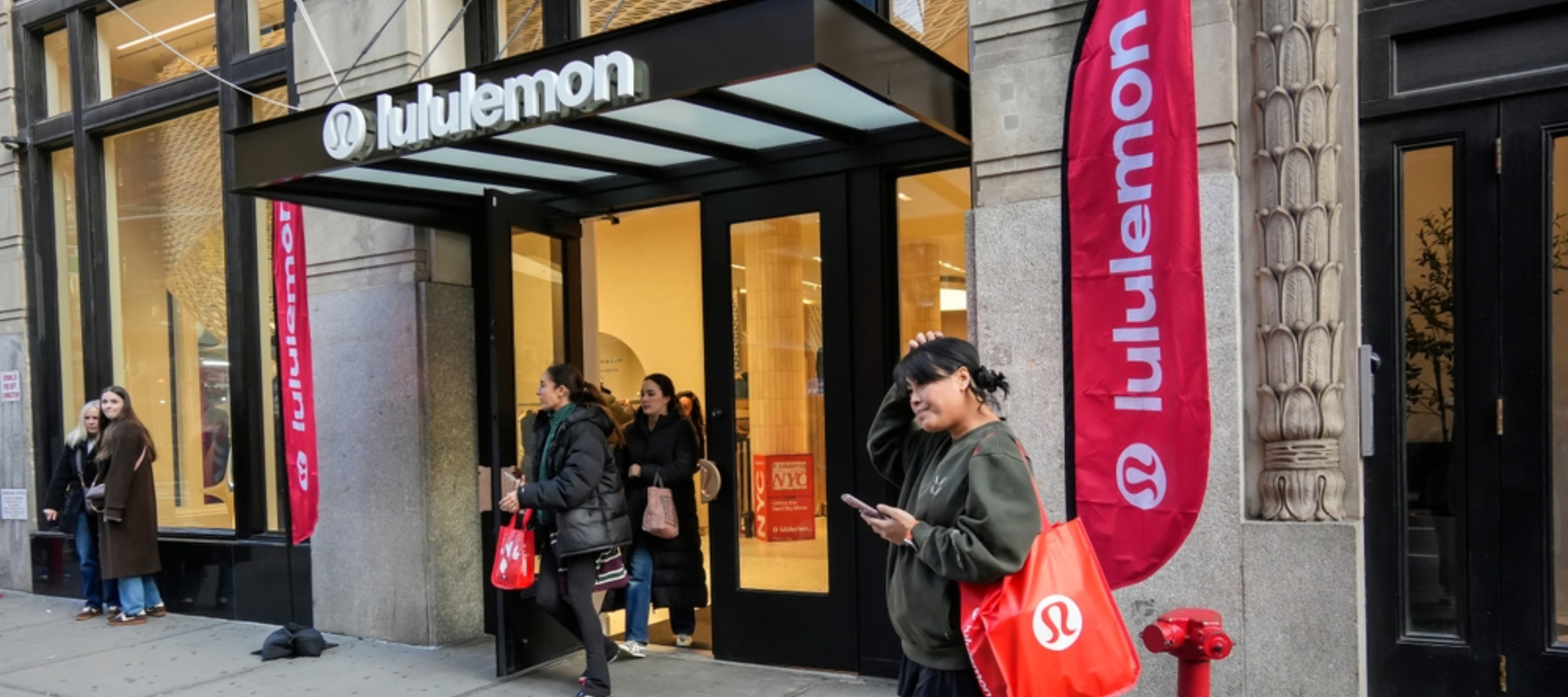 People coming out of a Lululemon store