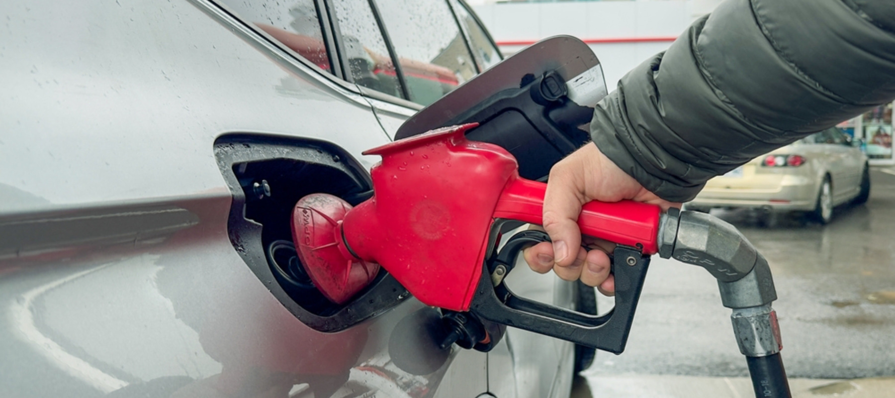 Person pumping gas