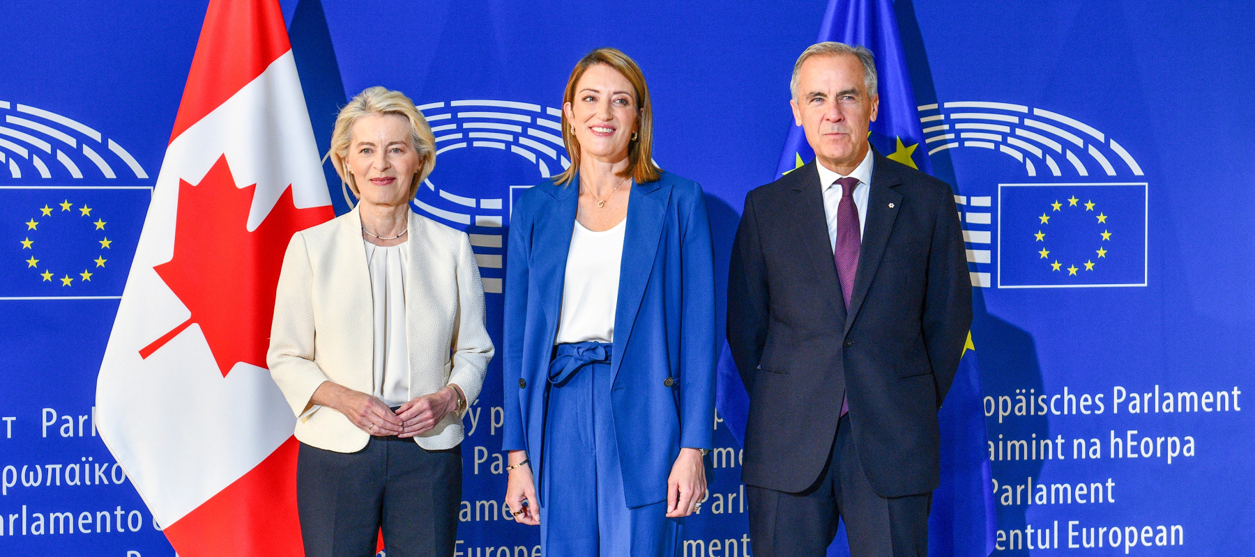 European Commission President Ursula von der Leyen, European Parliament President Roberta Metsola and Canadian Prime Minister Mark Carney pose for a group photograph