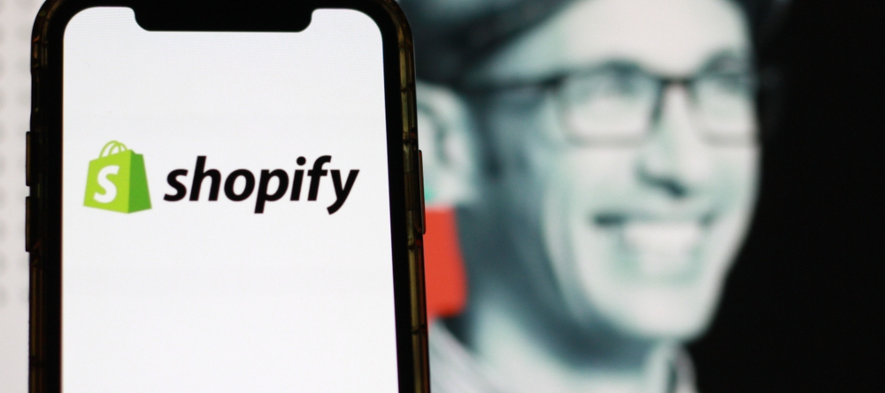 Shopify logo and CEO Tobias Lütke
