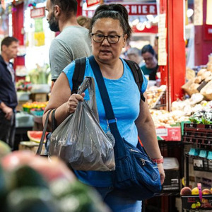 People shop inside of St. Lawrence Market