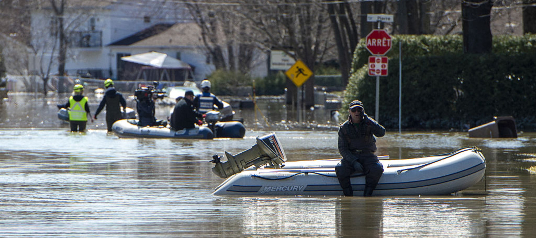 Rescue on a street submerged in flood waters in the Montreal suburb of Sainte-Marthe-sur-le-Lac, Quebec, Canada, April 29, 2019.
