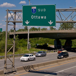 Avis car rental sign and driving to Ottawa