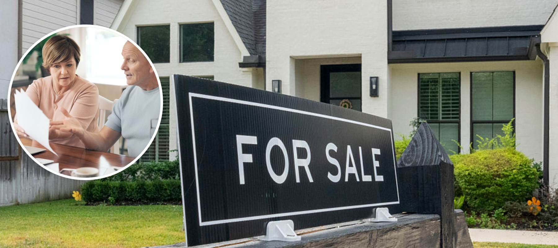 Stressed couple looking at home prices