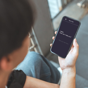 RBC logo and person using AI chatbot