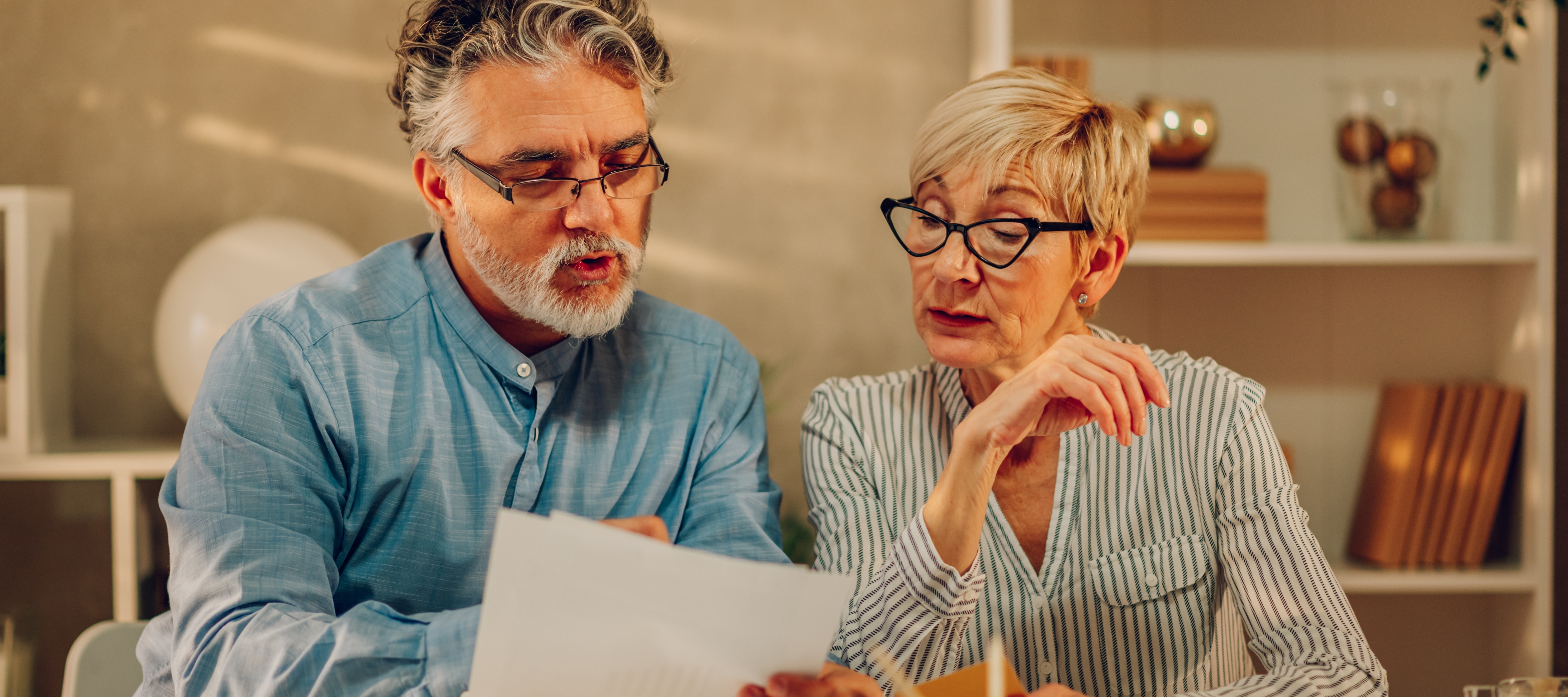 Older couple paying bills