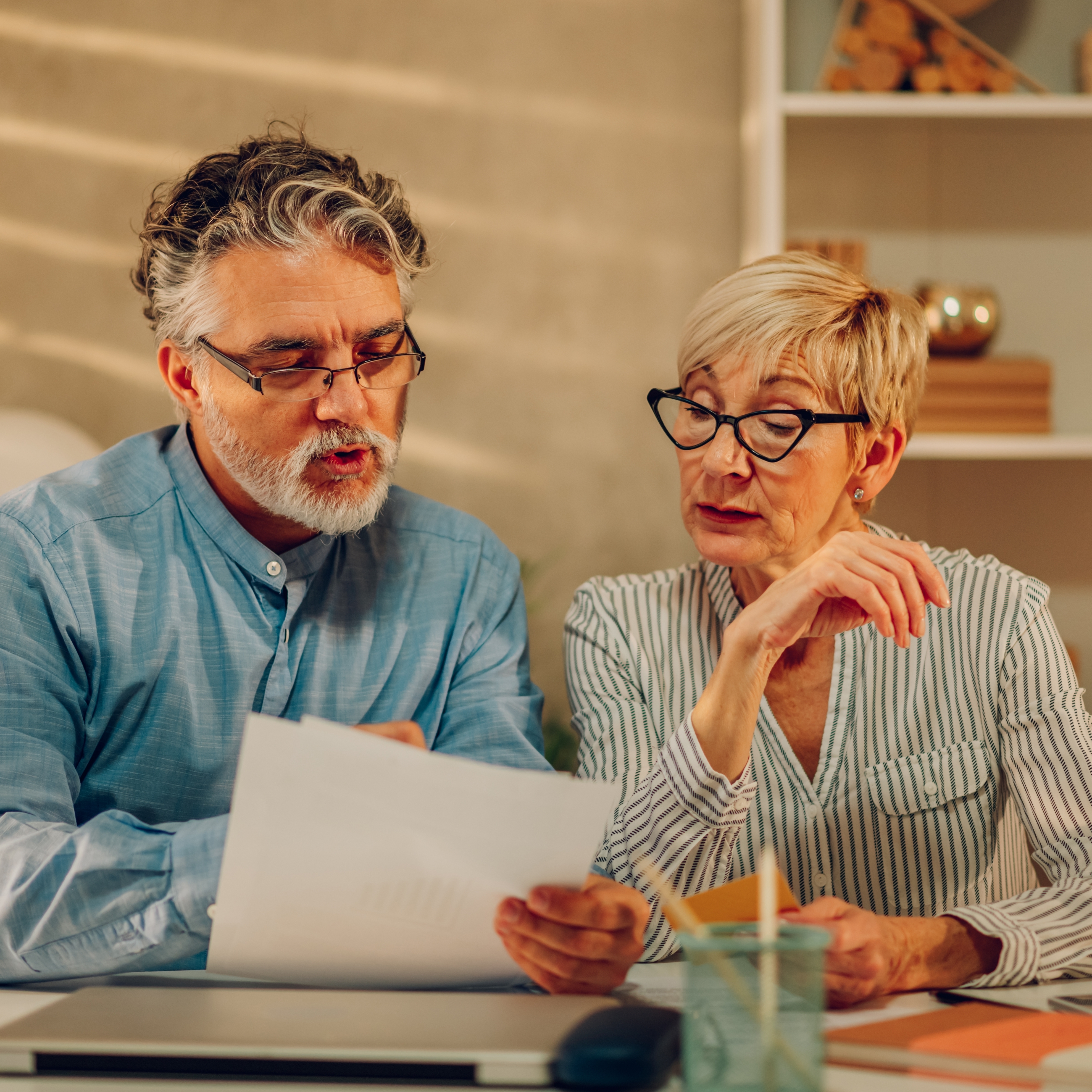 Older couple paying bills